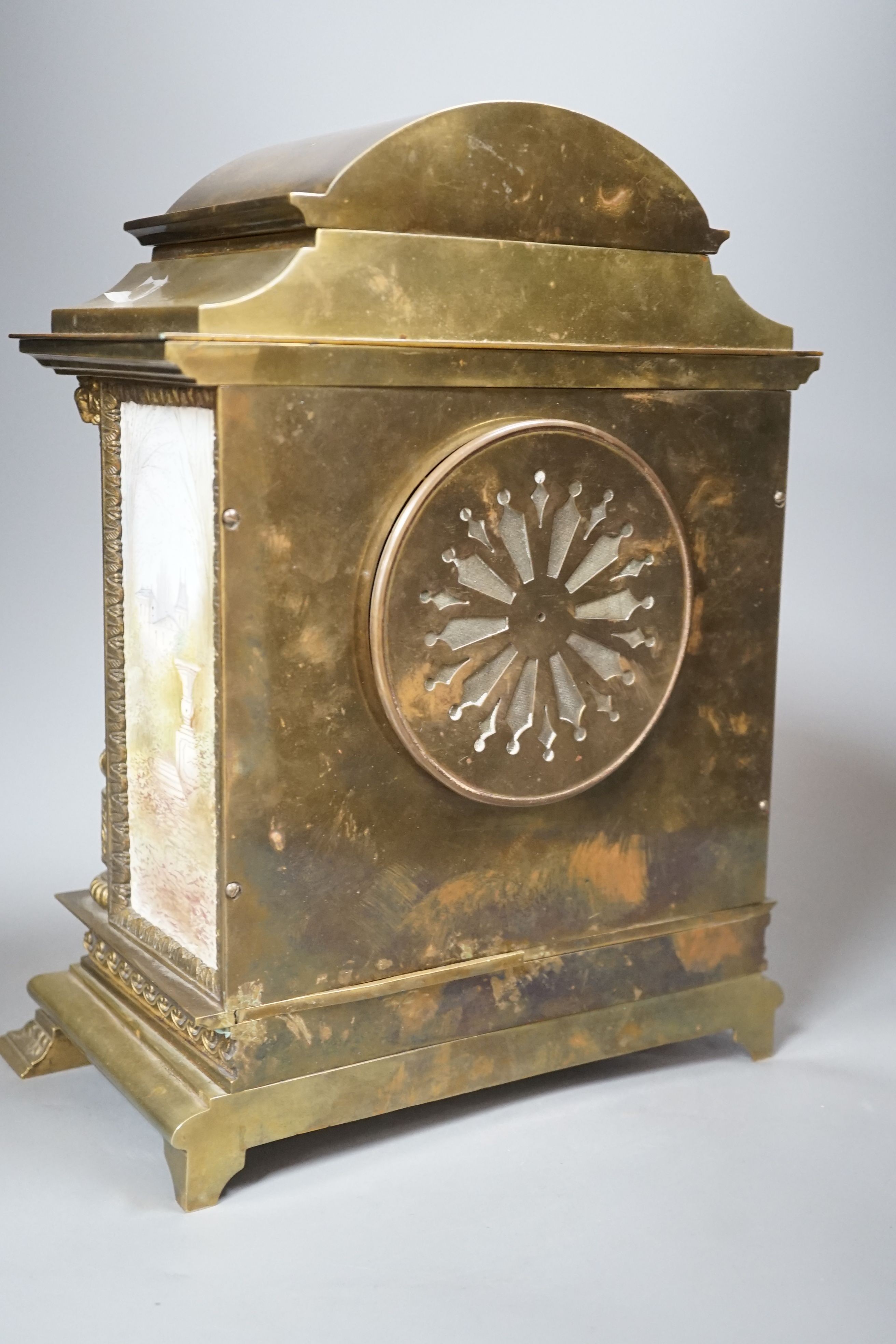 A French porcelain mounted brass mantel clock-31 cms high.